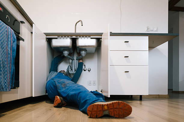 Professional Emergency Plumber technician working in Ferron, UT